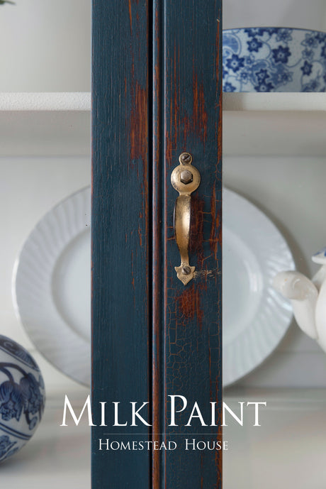 Homestead House Homestead Blue Milk Paint delivers a vintage, distressed finish that highlights wood grain.