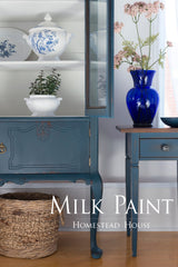 Homestead House Homestead Blue Milk Paint with blue vase, ceramics, and woven basket displayed together.