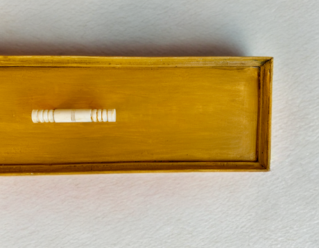 Yellow rectangular box with white cylinder lid, painted Honey by DIY Paint Co. Cottage Color line.