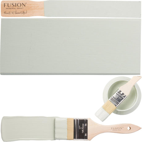 Fusion Mineral Paint Inglenook swatches and brushes on wood samples, with a small labeled bowl.