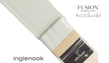 Brush with Inglenook Fusion Mineral Paint on bristles, Fusion Mineral Paint branding visible.