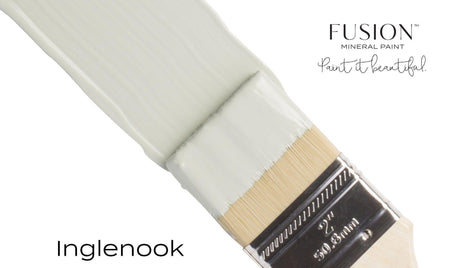 Brush with Inglenook Fusion Mineral Paint on bristles, Fusion Mineral Paint branding visible.