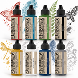 Eight IOD Decor Ink bottles arranged in two rows.