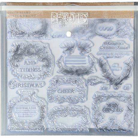 I.O.D. Stamp Storage Envelope with ornate Christmas and holiday-themed designs and phrases for organizing stamps.
