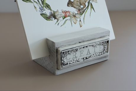 IOD Wood Block Stands (Pack of Two) by I.O.D. with CREATE plaque in ornate lettering, for holding art paper.