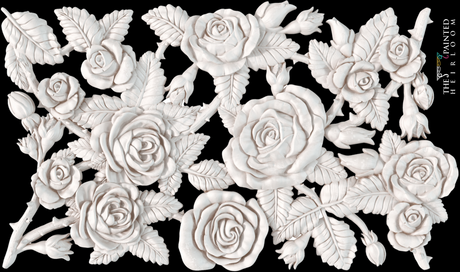 White roses and leaves made with IOD Juliette Mould form a dense floral pattern on a black background.