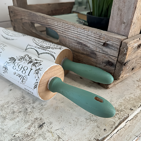 Two rolling pins with green handles, displayed next to a crate for Juniper DIY Cottage Color by DIY Paint Co.