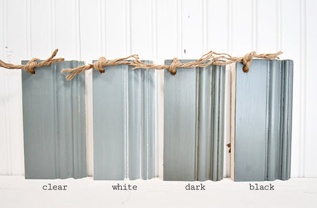 Four trim samples—clear, white, dark, and black—show the Juniper finish from Old Fashioned Milk Paint.