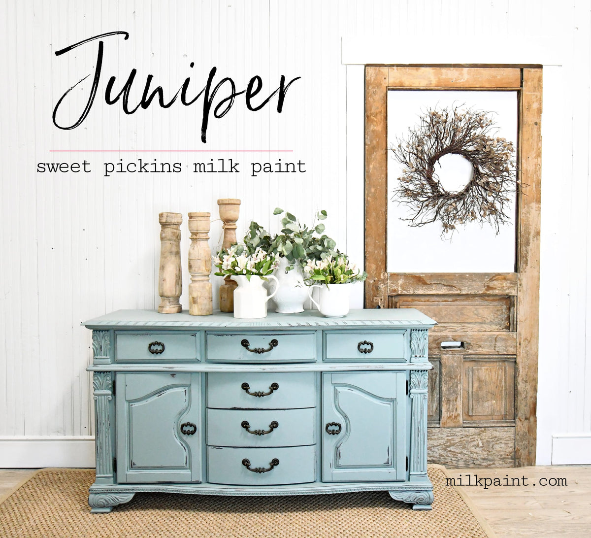 Sideboard painted in Juniper by Old Fashioned Milk Paint with vases and greenery displayed on top.