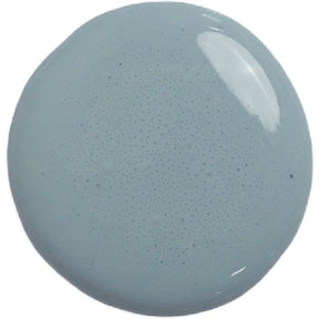 Round swatch of Kent by Old Fashioned Milk Paint in pale gray-blue, smooth with a soft reflective spot upper right.