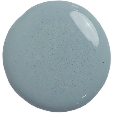 Round swatch of Kent by Old Fashioned Milk Paint in pale gray-blue, smooth with a soft reflective spot upper right.