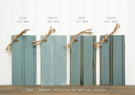 Four wood samples with different oil wax finishes, all painted Kent by Sweet Pickins Old Fashioned Milk Paint.