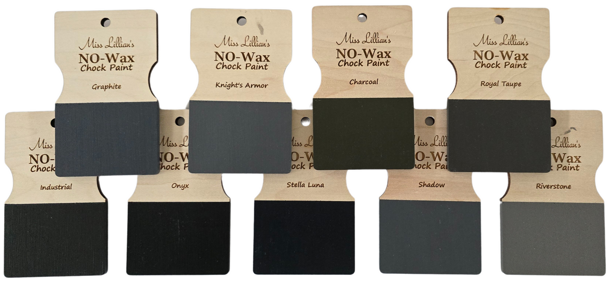 Eight wood swatches in dark gray and Royal Taupe Miss Lillian’s No-Wax Chock Paint for furniture makeovers.