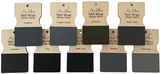 Eight wood swatches in dark gray and Royal Taupe Miss Lillian’s No-Wax Chock Paint for furniture makeovers.