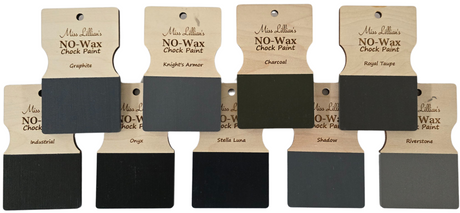 Eight wood swatches in dark gray and Royal Taupe Miss Lillian’s No-Wax Chock Paint for furniture makeovers.