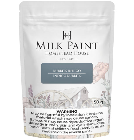 50g Kurbits Indigo Milk Paint pouch by Homestead House with floral barn art and health warning at bottom.