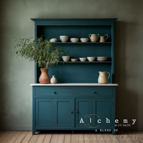 Teal hutch with pottery; text reads Lagoon Alchemy Paint by Fusion Mineral Paint.