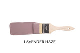 Fusion Mineral Paint brush in Lavender Haze shade with “LAVENDER HAZE” label on a white background.