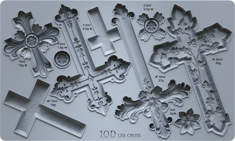 Les Croix Mould by I.O.D., cross-themed silicone mold with volume and weight labeling visible on packaging.