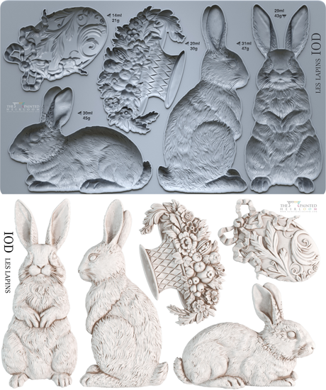 Les Lapins Mould by I.O.D. with gray tray featuring vintage rabbits, fish motif, and white molded replicas.