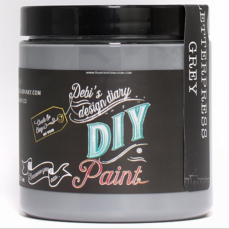 DIY Paint Co. Letterpress Grey DIY Paint jar with colorful label and black lid.