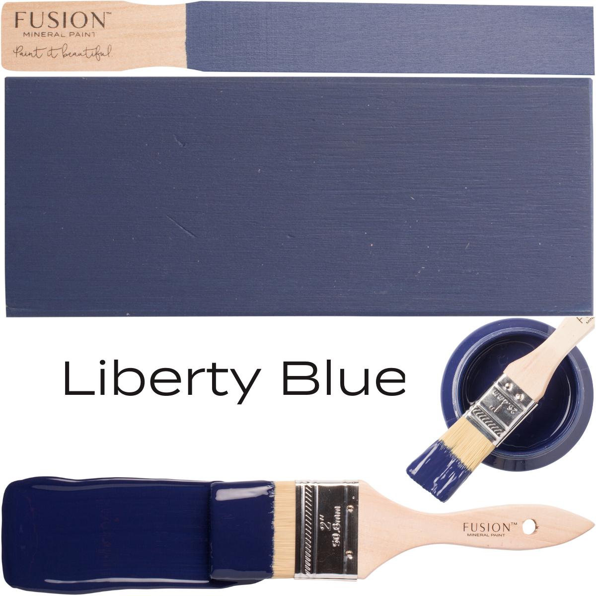Wooden paintbrush with painted surface in Liberty Blue by Fusion Mineral Paint.