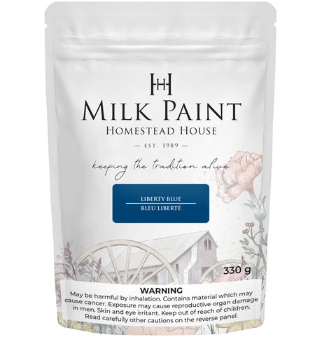 330g bag of Liberty Blue Milk Paint by Homestead House with floral art, branding, and warning label visible.