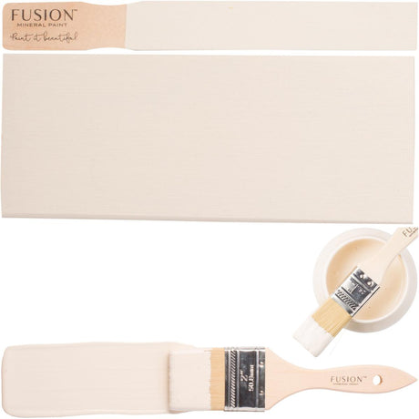 Paintbrush, swatch, and bowl with Limestone Fusion Mineral Paint by Fusion Mineral Paint on a white background.
