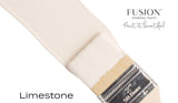 Brush with off-white, matte Limestone Fusion Mineral Paint; Fusion Mineral Paint logo in top right corner.