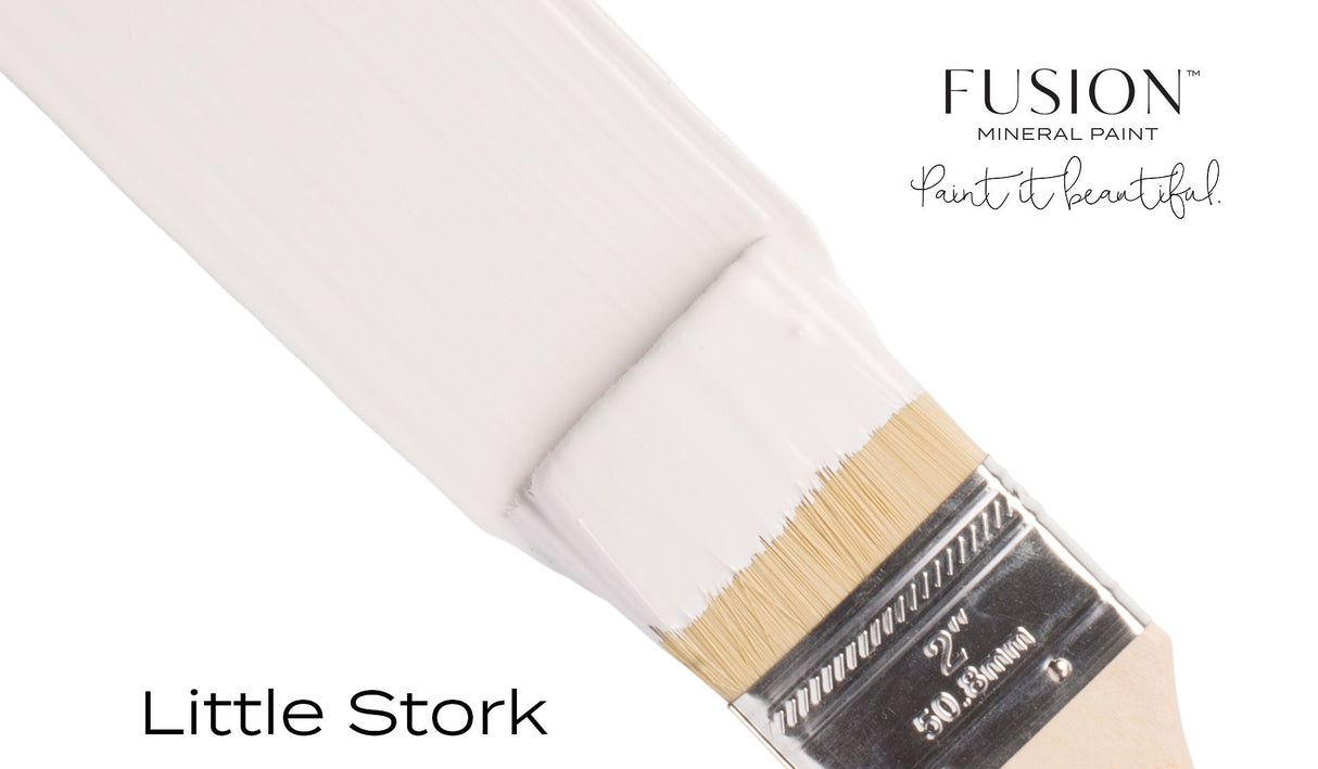 Paintbrush with Fusion Mineral Paint’s Little Stork (Limited Release) on a white background.