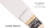Paintbrush with Fusion Mineral Paint’s Little Stork (Limited Release) on a white background.