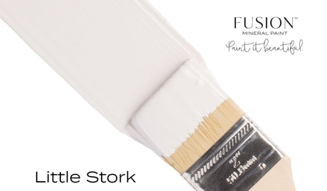 Paintbrush with Fusion Mineral Paint’s Little Stork (Limited Release) on a white background.
