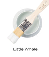 Open jar of Little Whale Fusion Mineral Paint with brush resting on top; below is the text “Little Whale”.