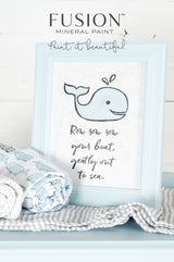 Framed print featuring a smiling blue whale in Little Whale Fusion Mineral Paint with “Row row row your boat” text.