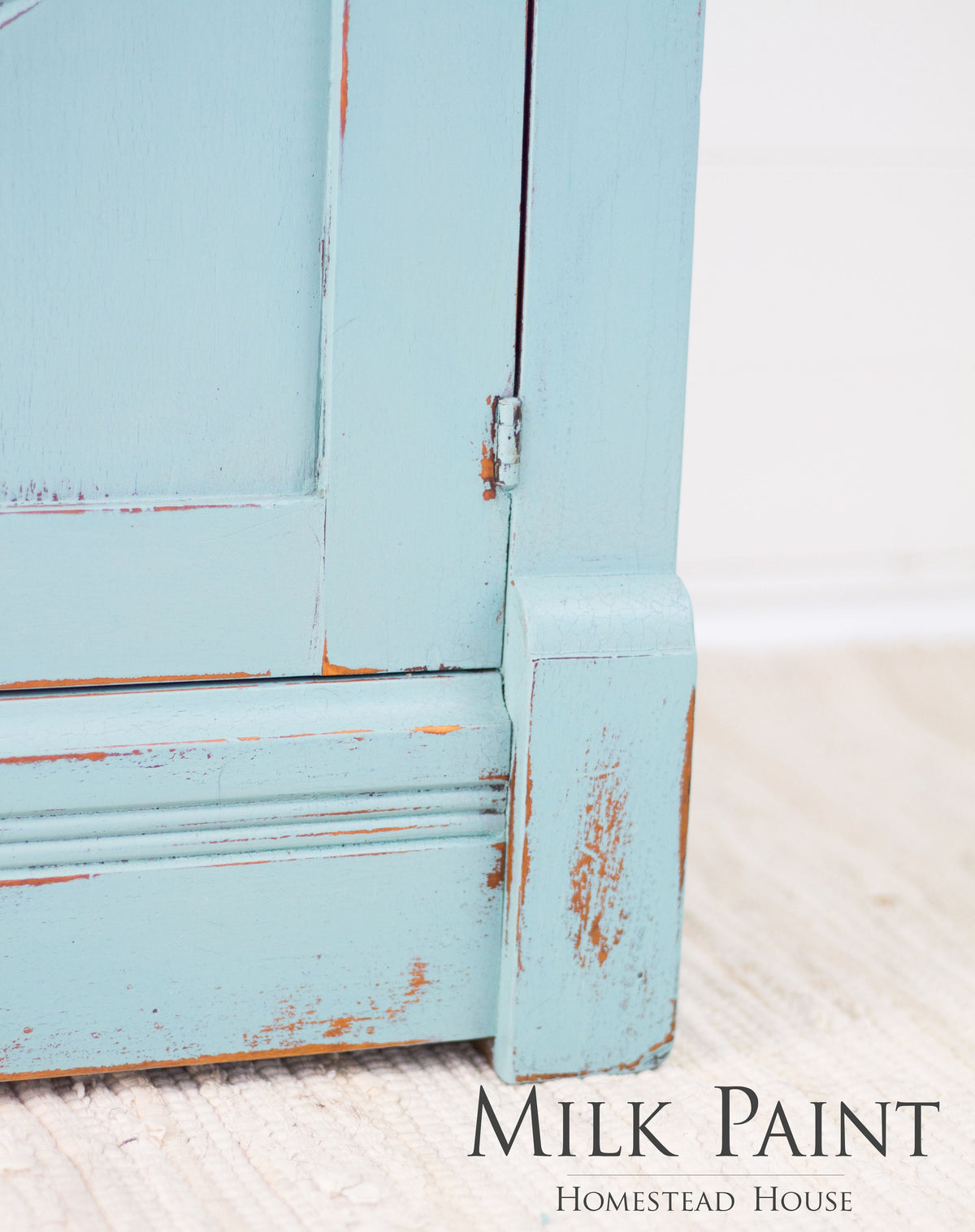 Distressed light blue cabinet, “Loyalist Milk Paint by Homestead House” text at bottom right.
