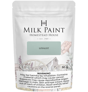 50g Loyalist Milk Paint by Homestead House with floral and wagon design on the packaging.