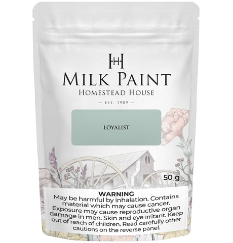 50g Loyalist Milk Paint by Homestead House with floral and wagon design on the packaging.