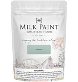 330g Homestead House Loyalist Milk Paint bag featuring floral and wagon artwork on the label.