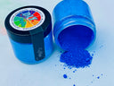 Making Powder by DIY Debi’s Design Diary from DIY Paint Co., bright blue pigment spilled on white beside its lid.