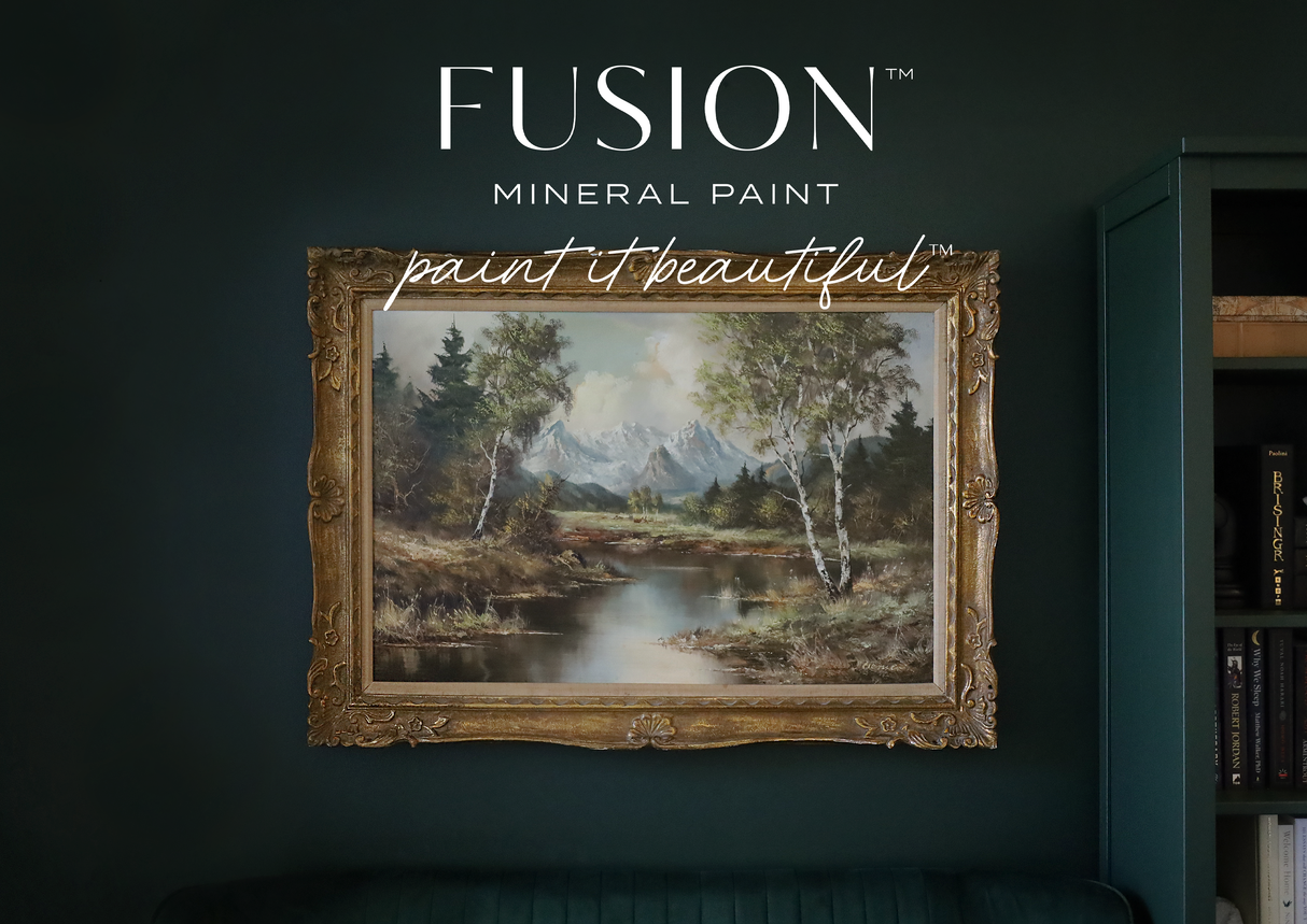 Framed landscape art on Manor Green Fusion Mineral Paint wall with “Fusion Mineral Paint” text above.