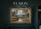 Framed landscape art on Manor Green Fusion Mineral Paint wall with “Fusion Mineral Paint” text above.