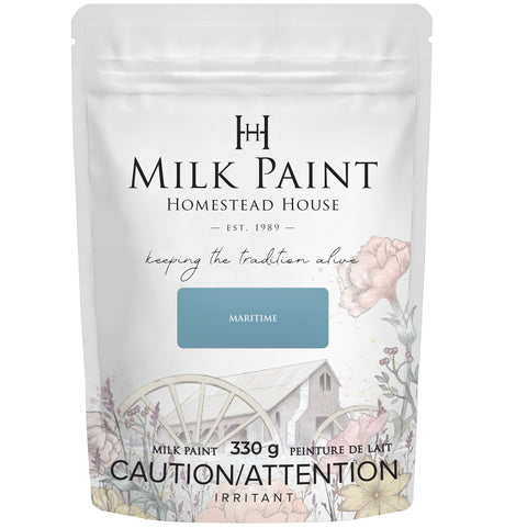 Homestead House Maritime Blue Milk Paint in resealable pouch with farmhouse graphic and product information on packaging.