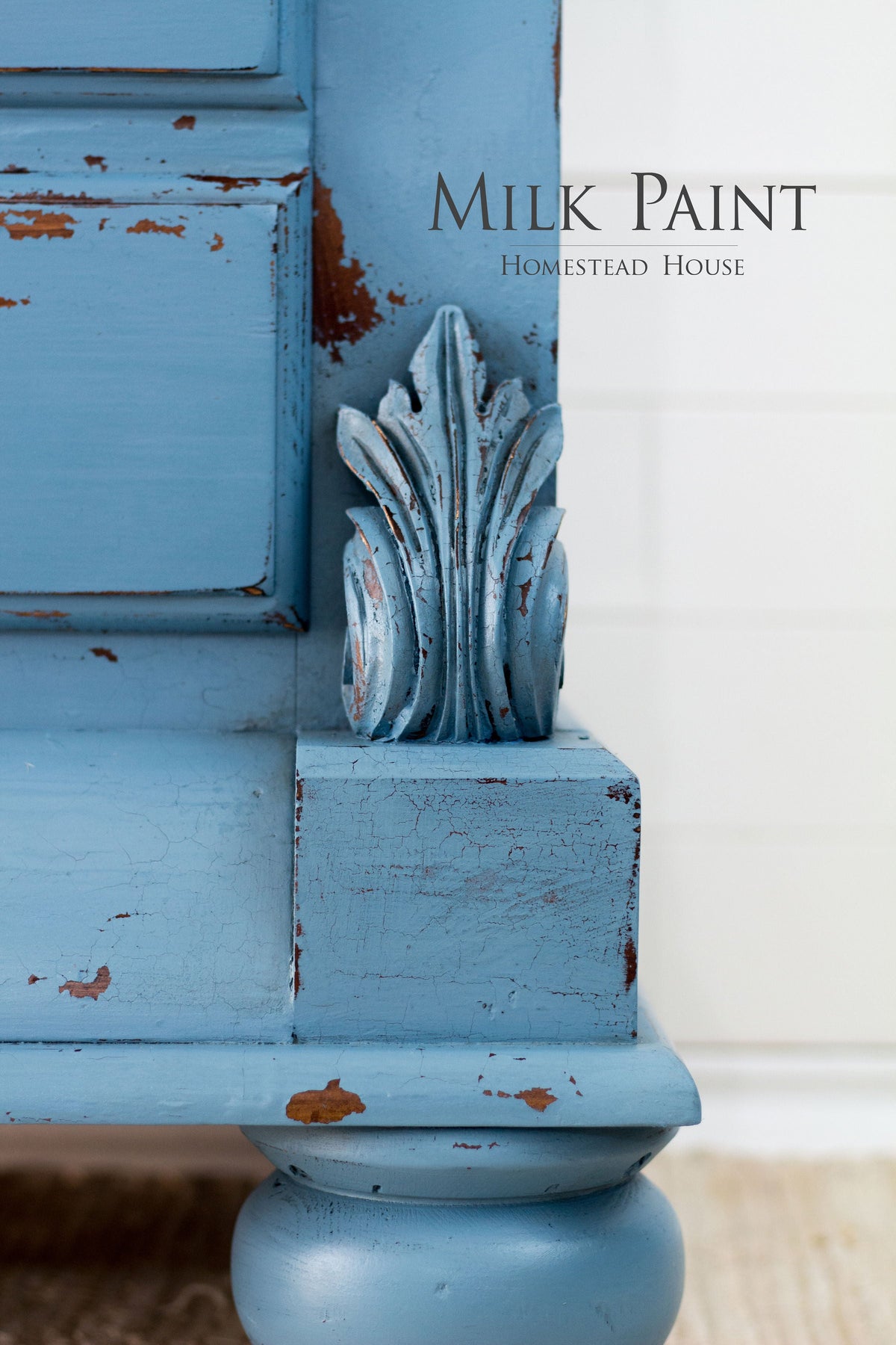 Maritime Blue Milk Paint by Homestead House on ornate furniture corner, text reads “Homestead House”.