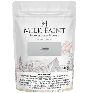 50g pouch of Matinee Milk Paint by Homestead House with warning text and “great paint coverage” at the bottom.
