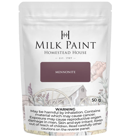 50g Homestead House Mennonite Red Milk Paint with cancer warning, floral, wagon, and barn illustrations on label.