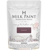 330g bag of Homestead House Mennonite Red Milk Paint, featuring wagon wheel and barn illustration on packaging.