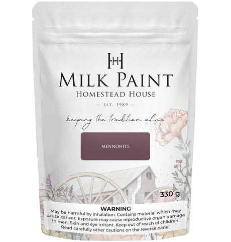 330g bag of Homestead House Mennonite Red Milk Paint, featuring wagon wheel and barn illustration on packaging.