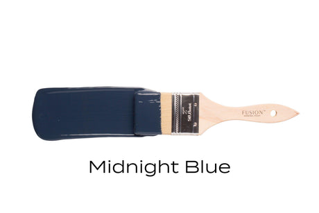 Brush with Midnight Blue Fusion Mineral Paint by Fusion Mineral Paint on a plain white background.