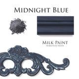 Homestead House Midnight Blue Milk Paint sample, powder, and wood trim displayed together.