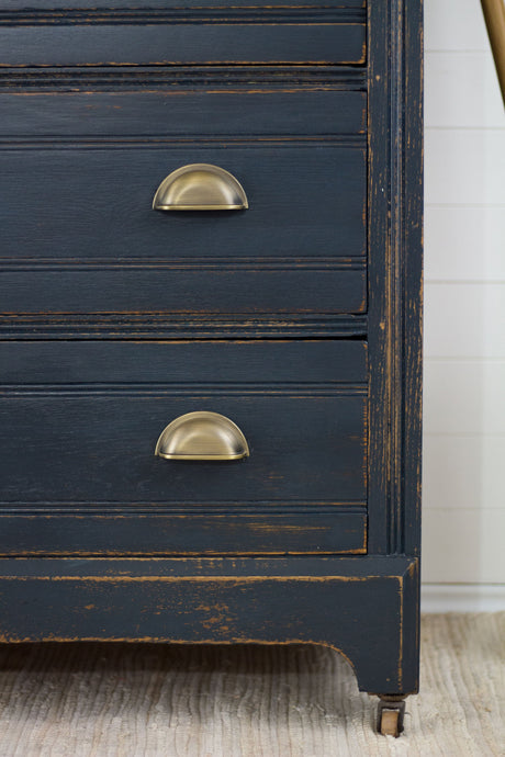 Homestead House Midnight Blue dresser with brass handles and visible wood grain details.